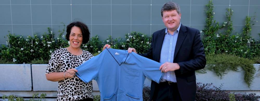 London Woman Diana Bates and Mr Steven Kelly holding a blue shirt